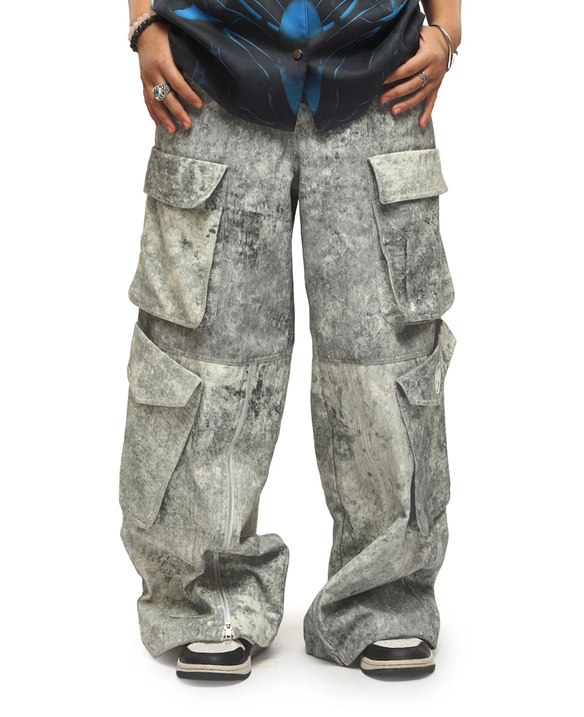 Ash-gray cargo pants with four flap cargo pockets and relaxed wide-leg silhouette.