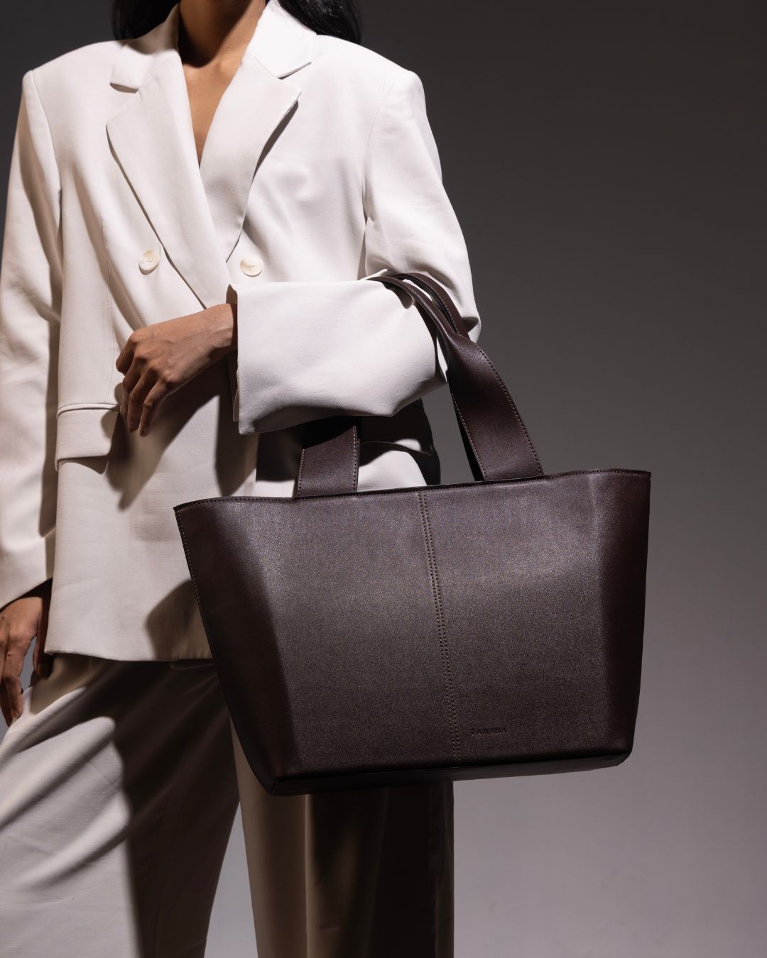 Dark brown leather-look tote bag with double top handles and open top