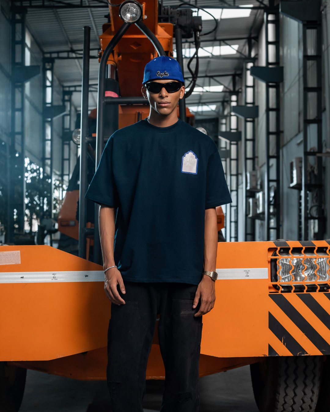 Dark navy T-shirt with small chest logo and crew neck