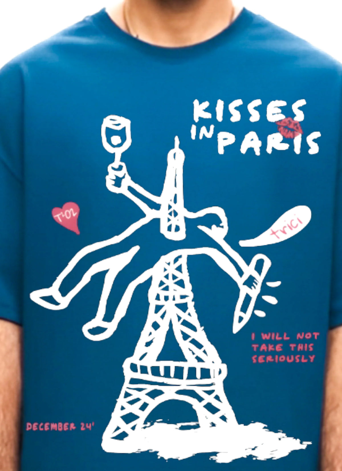 Blue T-shirt with large Eiffel Tower graphic and 'KISSES IN PARIS' on chest