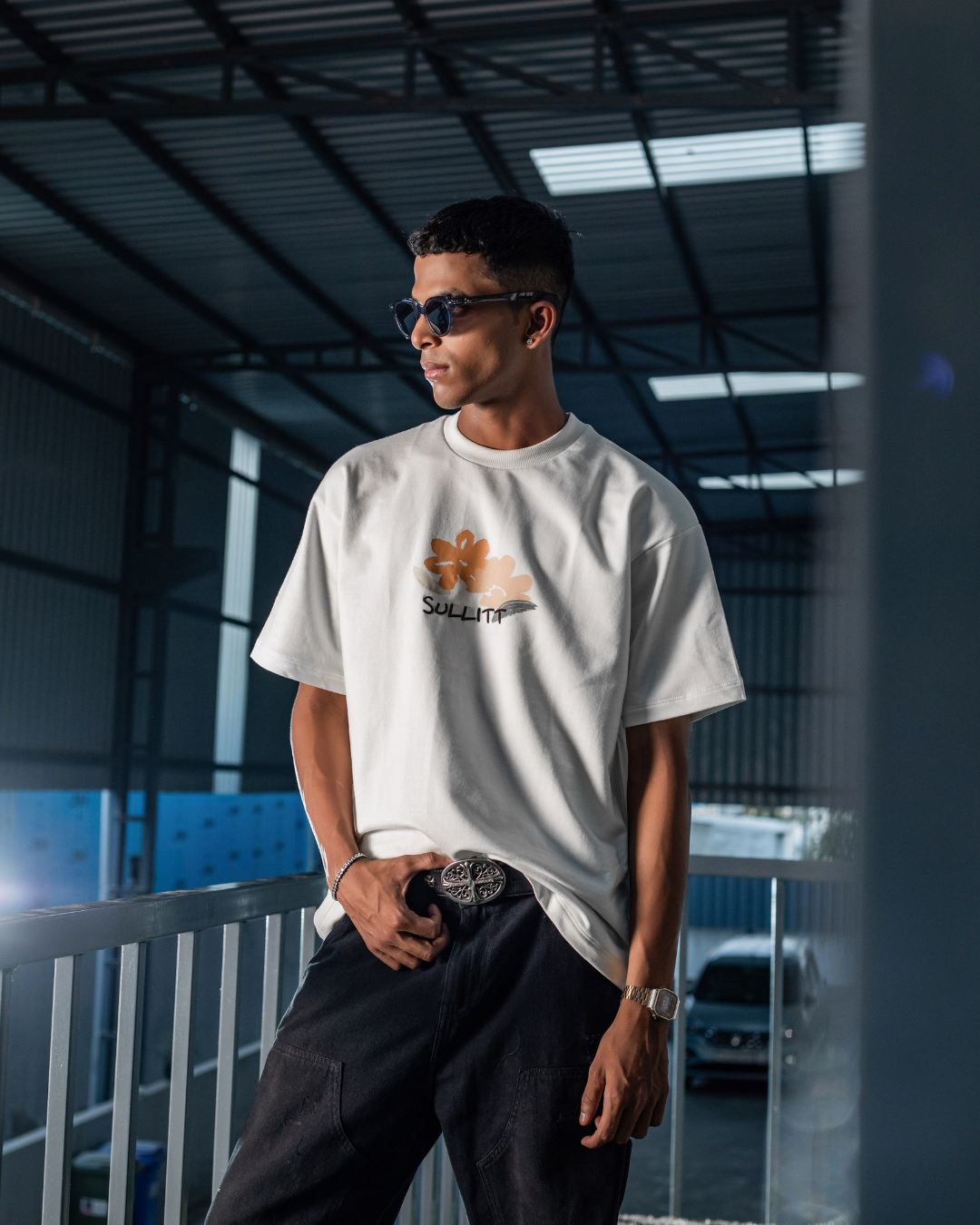 White crewneck graphic T-shirt with small front SunZeta logo