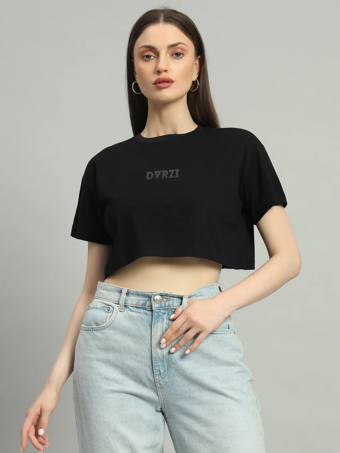 Black cropped T-shirt with short sleeves, crew neck, and centered DVRZI mark