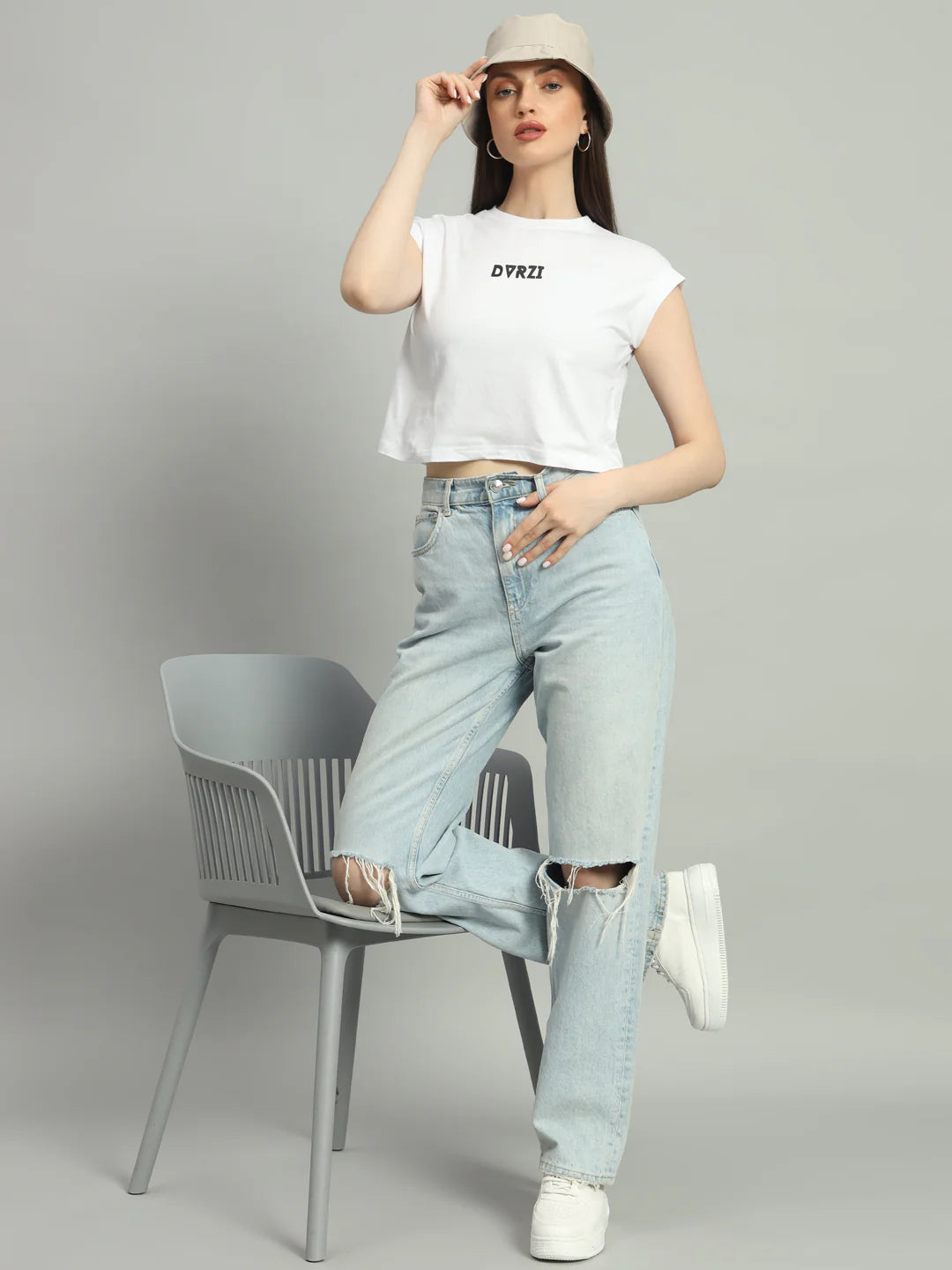 White short-sleeve cropped tee with DVRZI logo, crew neck