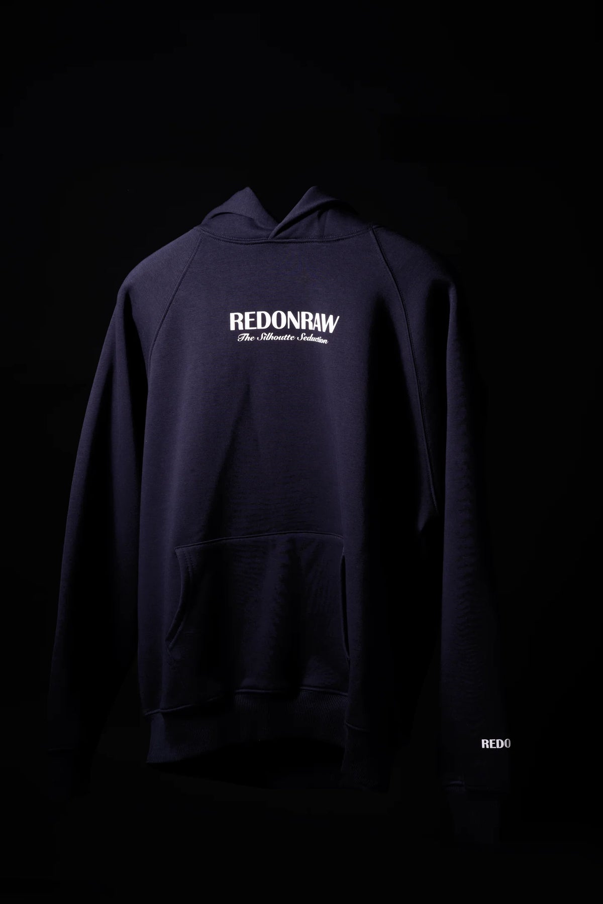 Dark navy pullover hoodie with hood and REDONRAW front logo print