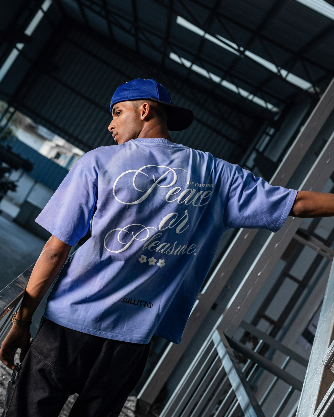 Light blue graphic T-shirt with back script text and small flower details