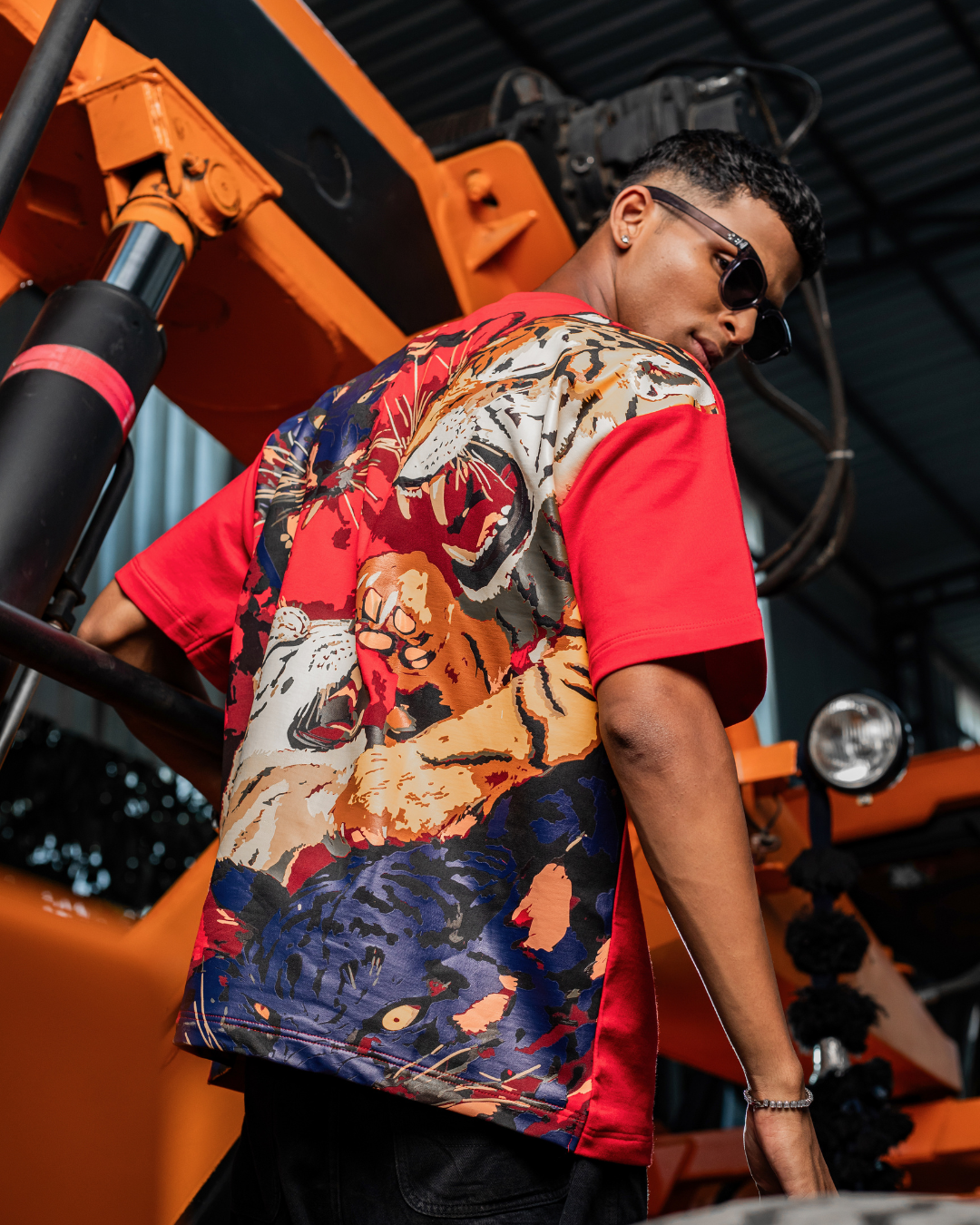 Red crew-neck T-shirt with large animal camo graphic back panel