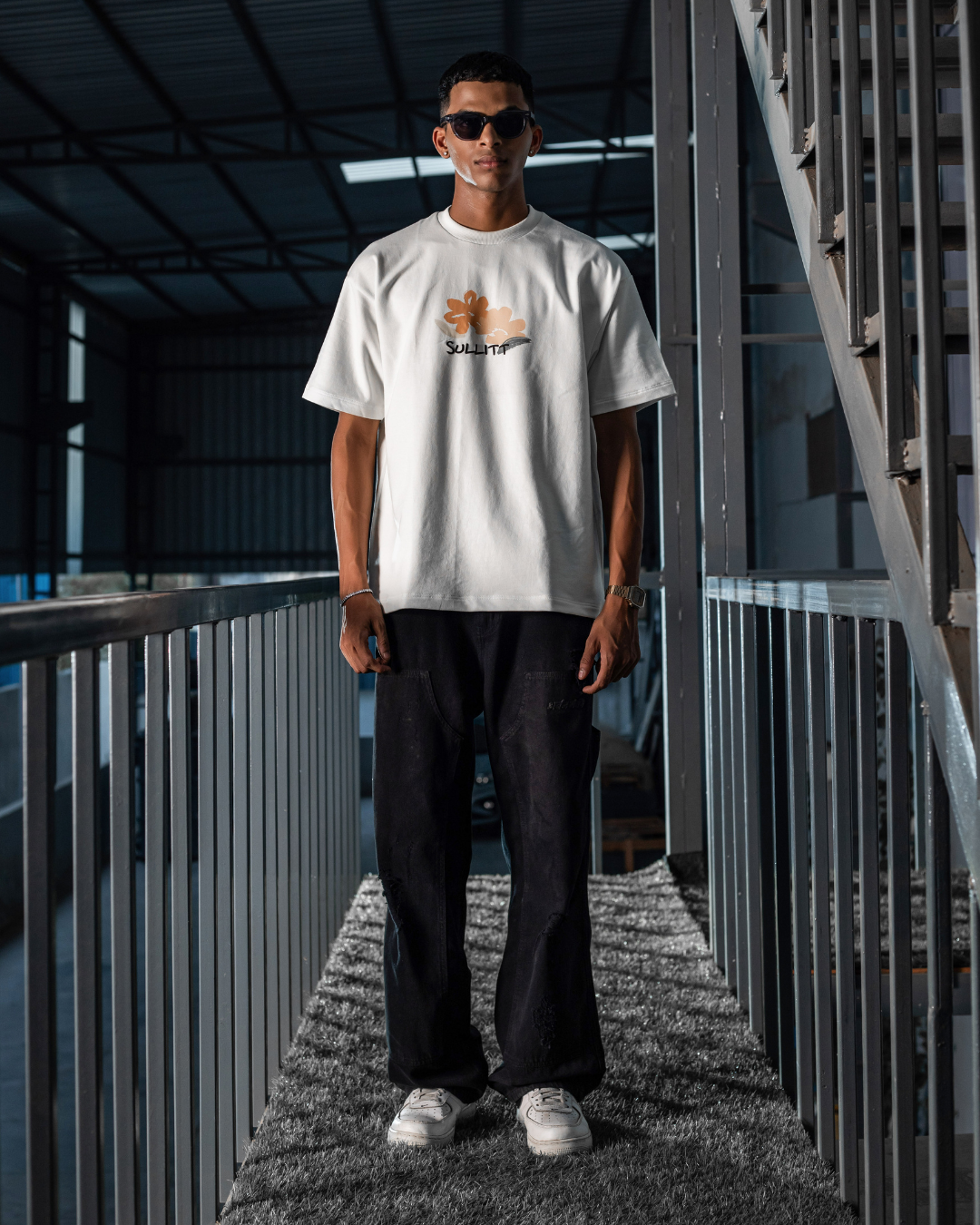 White crewneck graphic T-shirt with small front SunZeta logo, front view