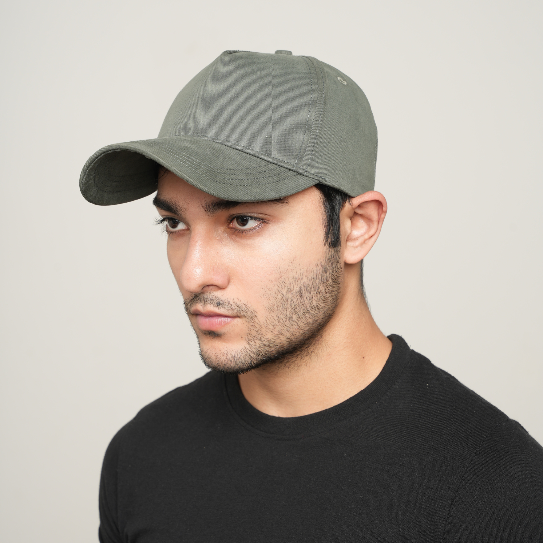 Olive green baseball cap with curved brim and stitched panels