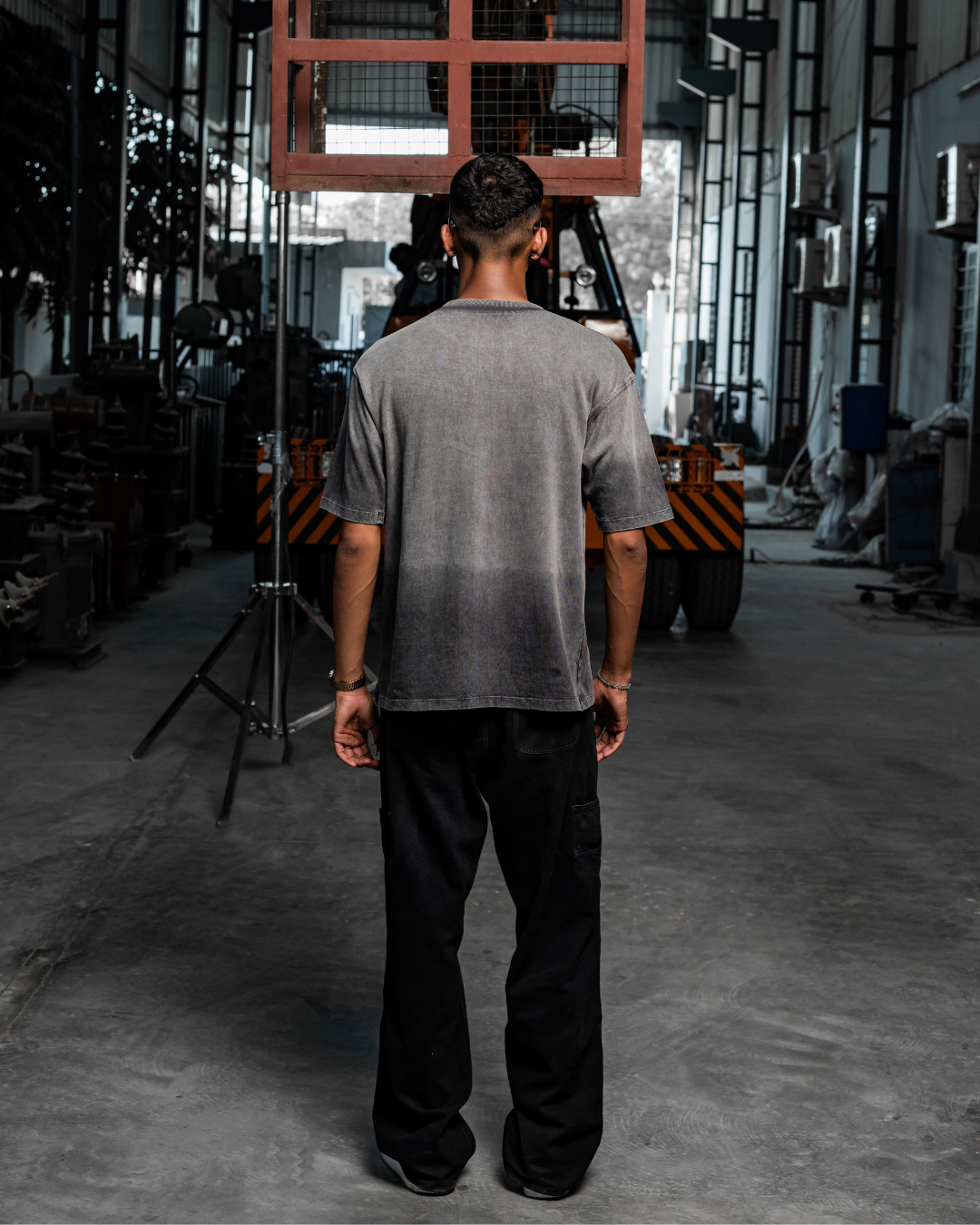 Threadbare grey crew-neck t-shirt, short sleeves, plain back view