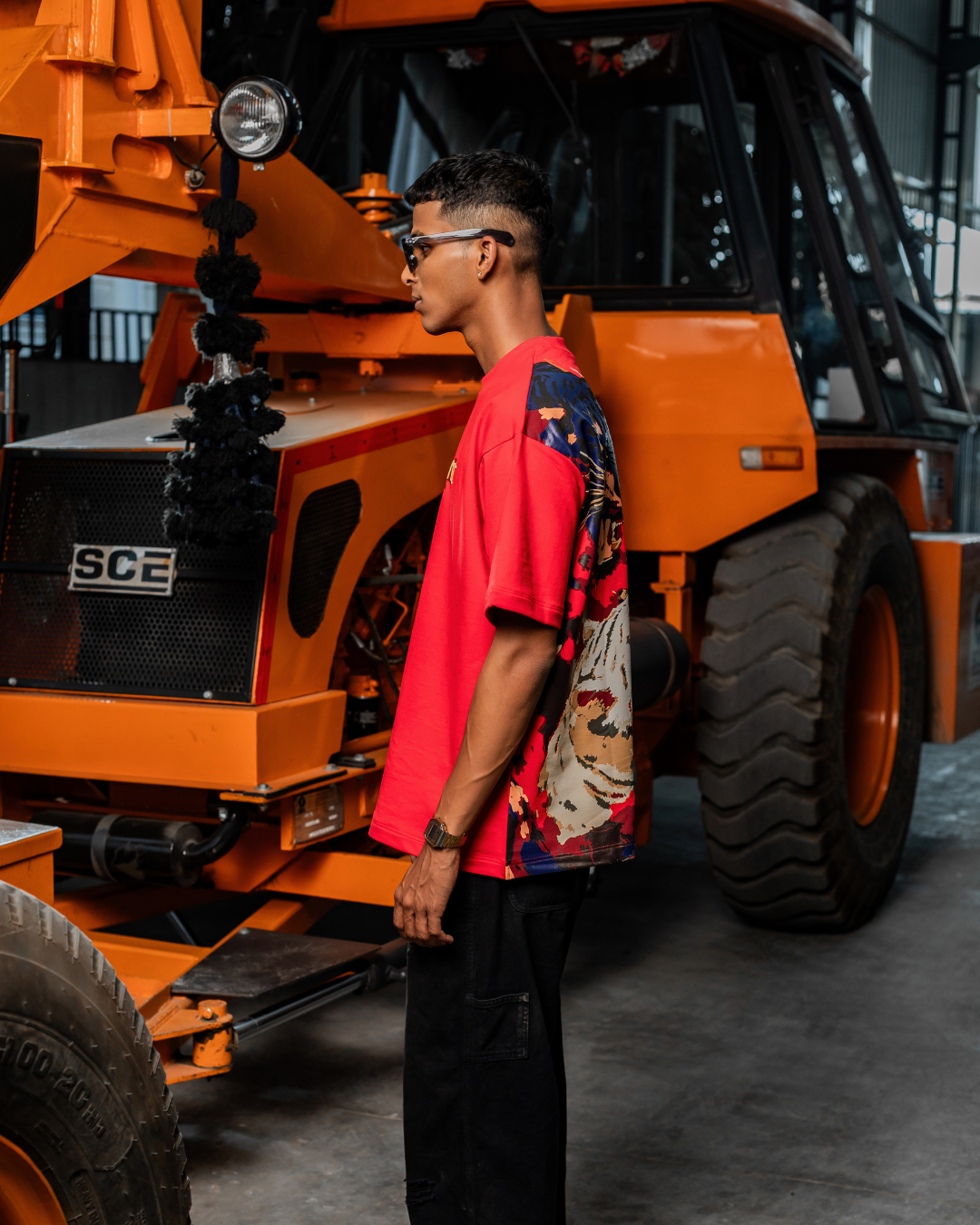 Red crew-neck T-shirt with animal camo panel on back