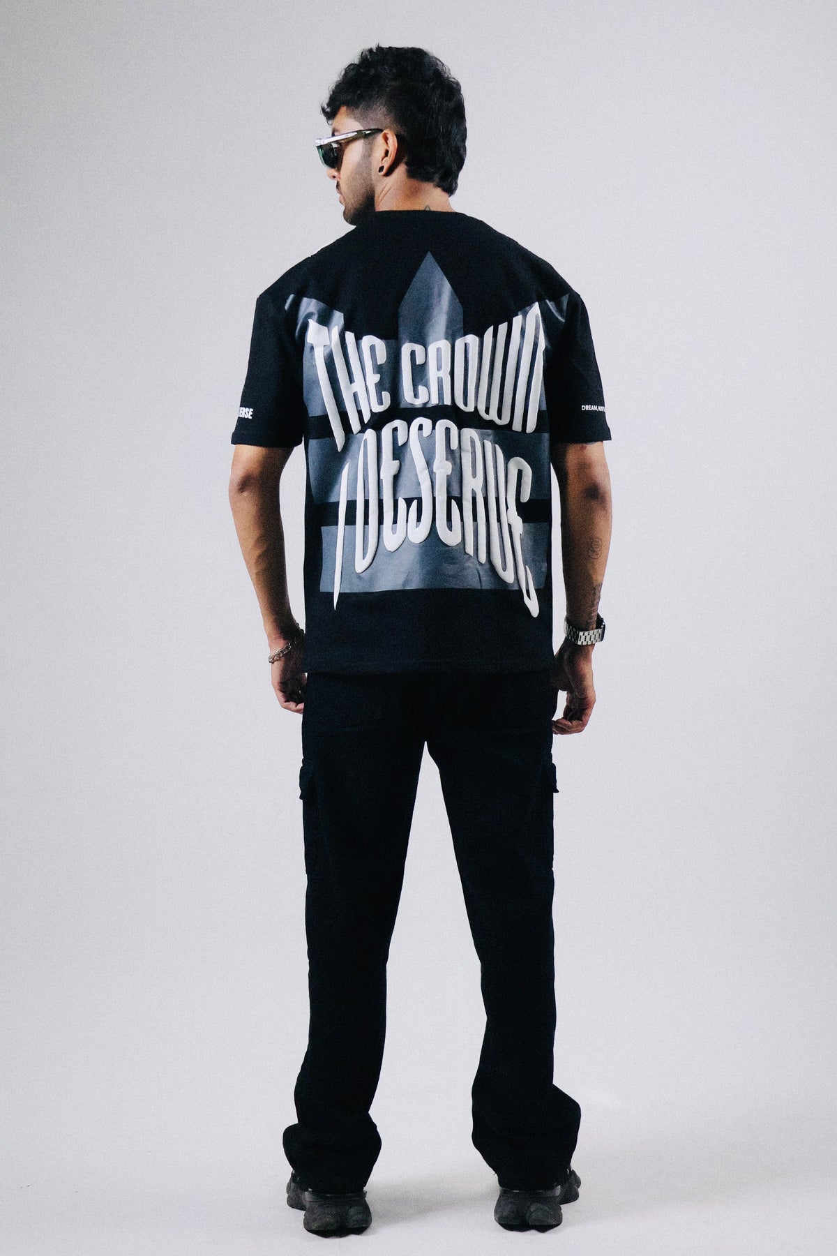 Oversized black T-shirt with large white back print and dripping text
