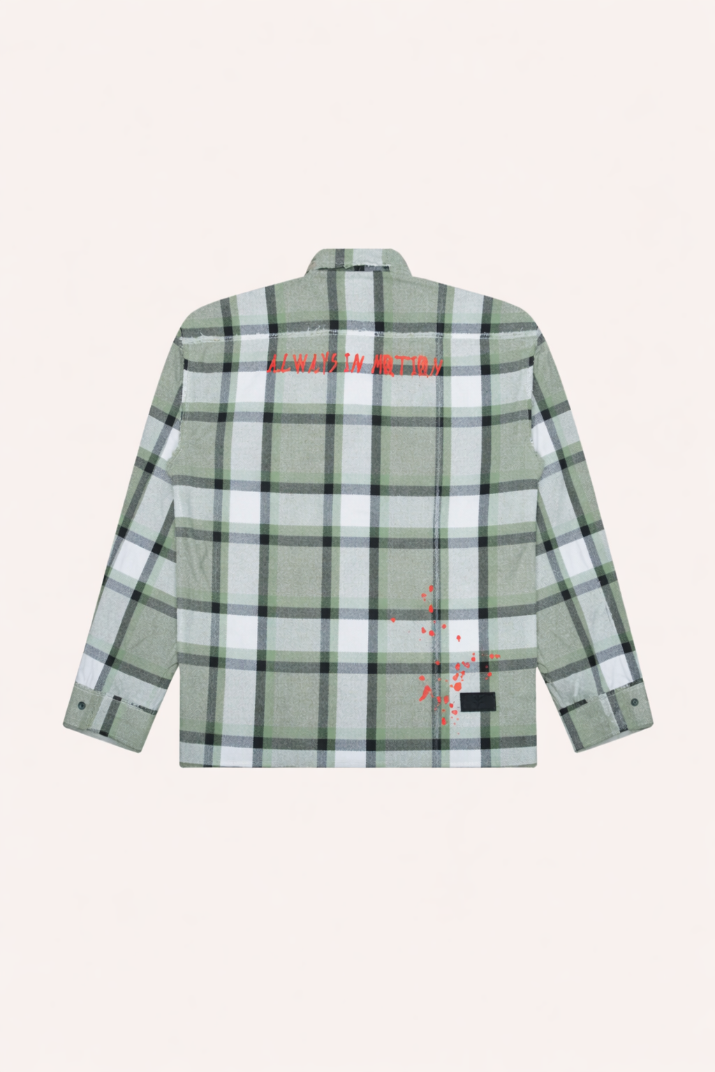 Plaid flannel shirt back with red text, red splatter, and snap button placket