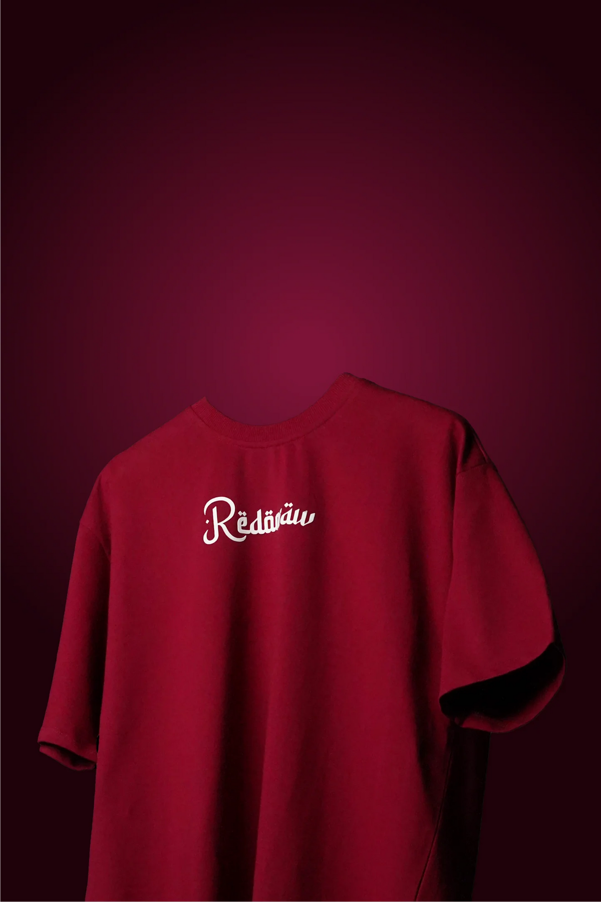 Crimson red T-shirt with small back logo-style Arabic white script