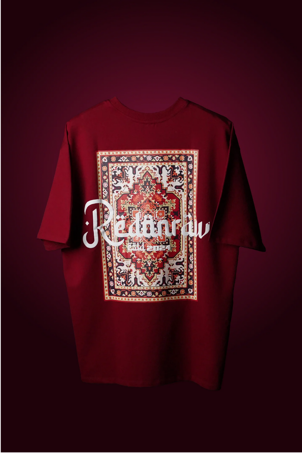 Crimson red T-shirt with front square ornate Arabic print and white text
