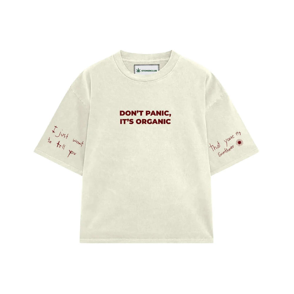 Off-white T-shirt with 'DON'T PANIC, IT'S ORGANIC' front text and red sleeve quotes.