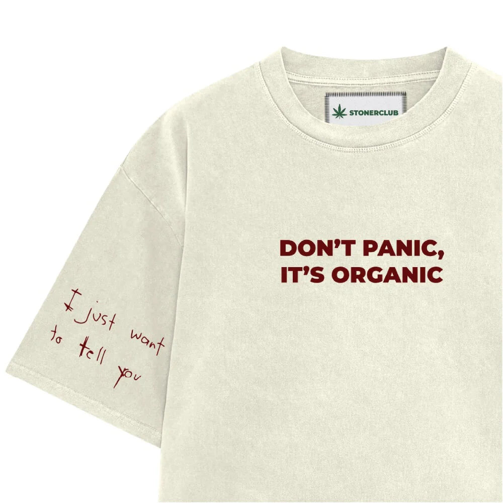 Off-white T-shirt with 'DON'T PANIC, IT'S ORGANIC' front and red side sleeve word art.