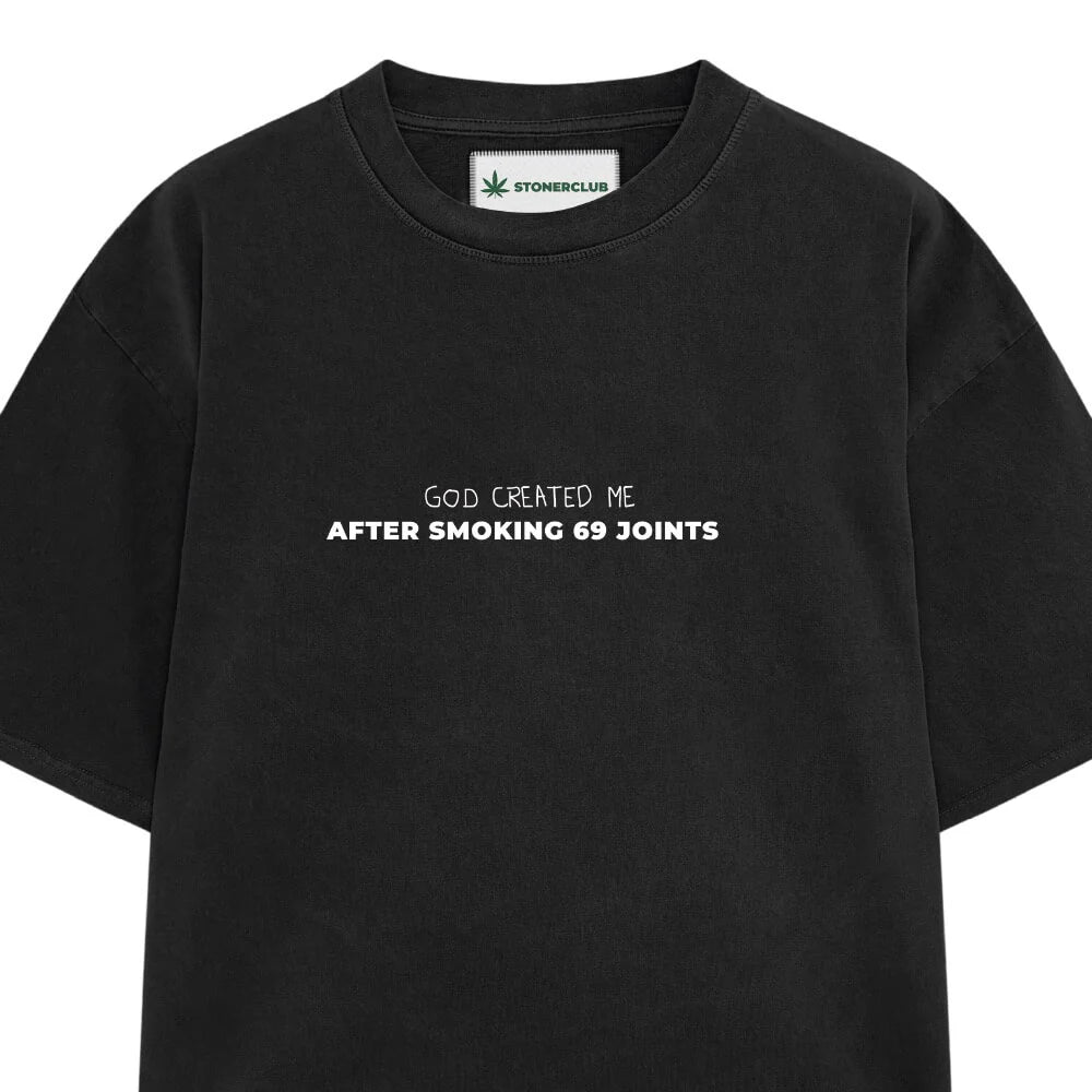 Black T-shirt with centered “God Created Me…” front text graphic