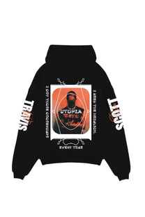 Black oversized hoodie with central graphic print and Travis sleeve text