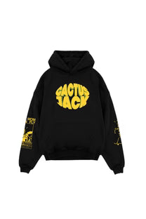 Oversized black hoodie with CACTUS JACK logo on chest and side yellow print