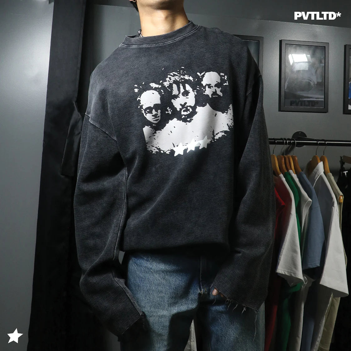 Charcoal long-sleeve crewneck sweatshirt with distressed face graphic on chest