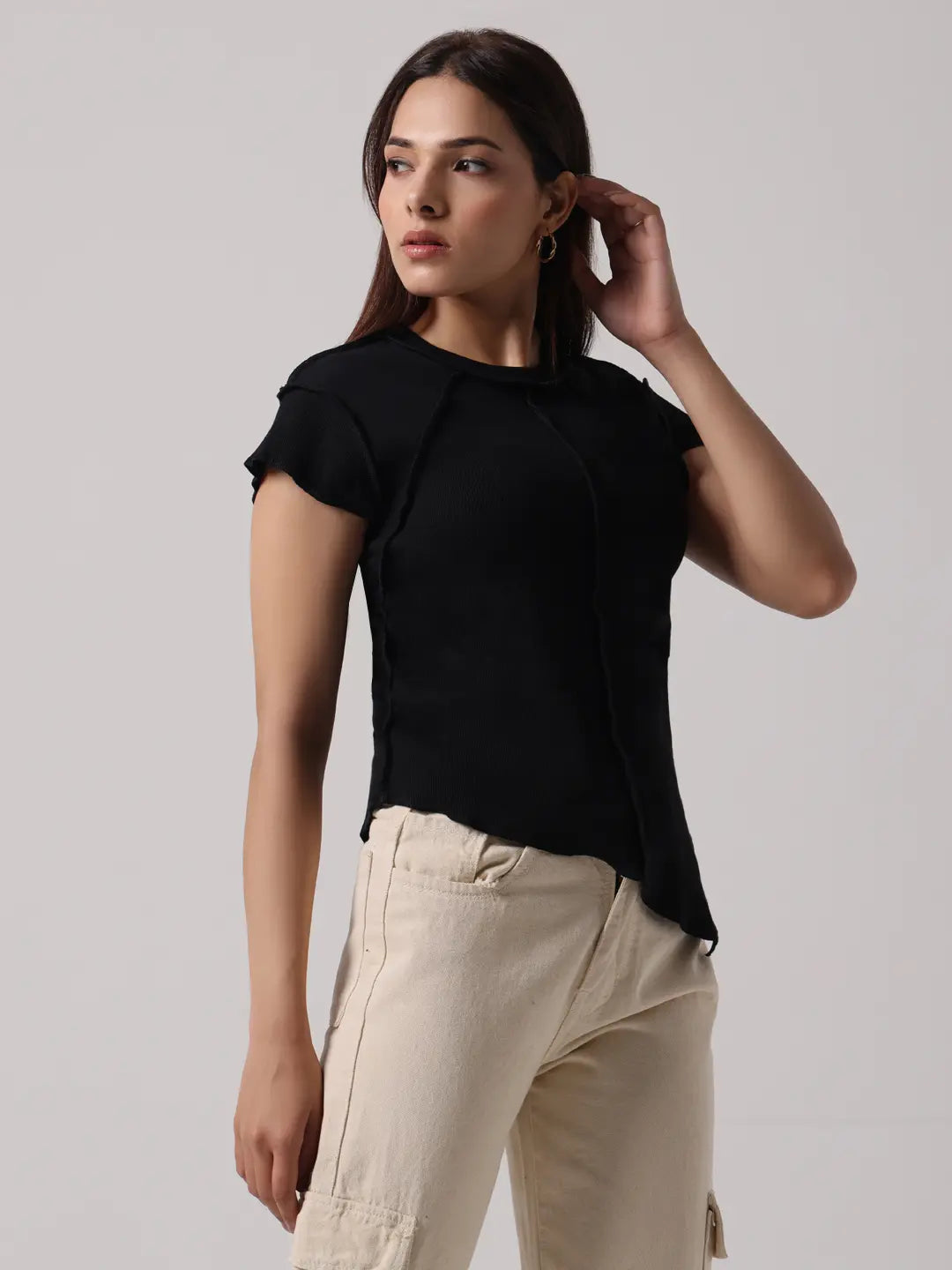 Black cap-sleeve top with short front placket and exposed stitching detail