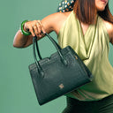 EMERALD ELEGANCE POISE HANDBAG STROKES GALLERY