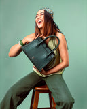 EMERALD ELEGANCE POISE HANDBAG STROKES GALLERY