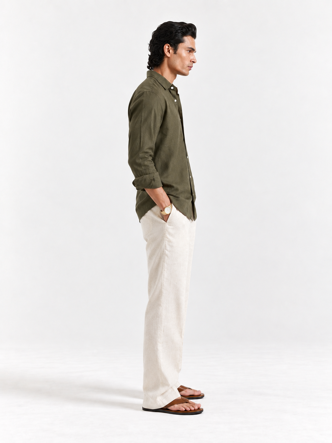 Olive linen button-up shirt, side profile view with long sleeves