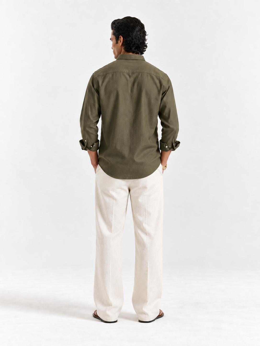 Olive linen button-up shirt from back view, long sleeves