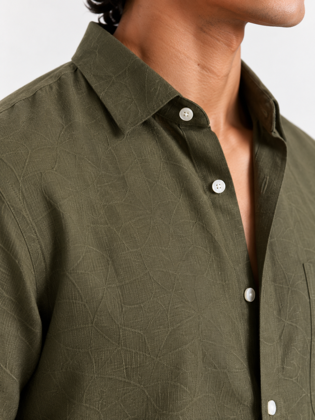 Olive linen button-up shirt with point collar and front buttons