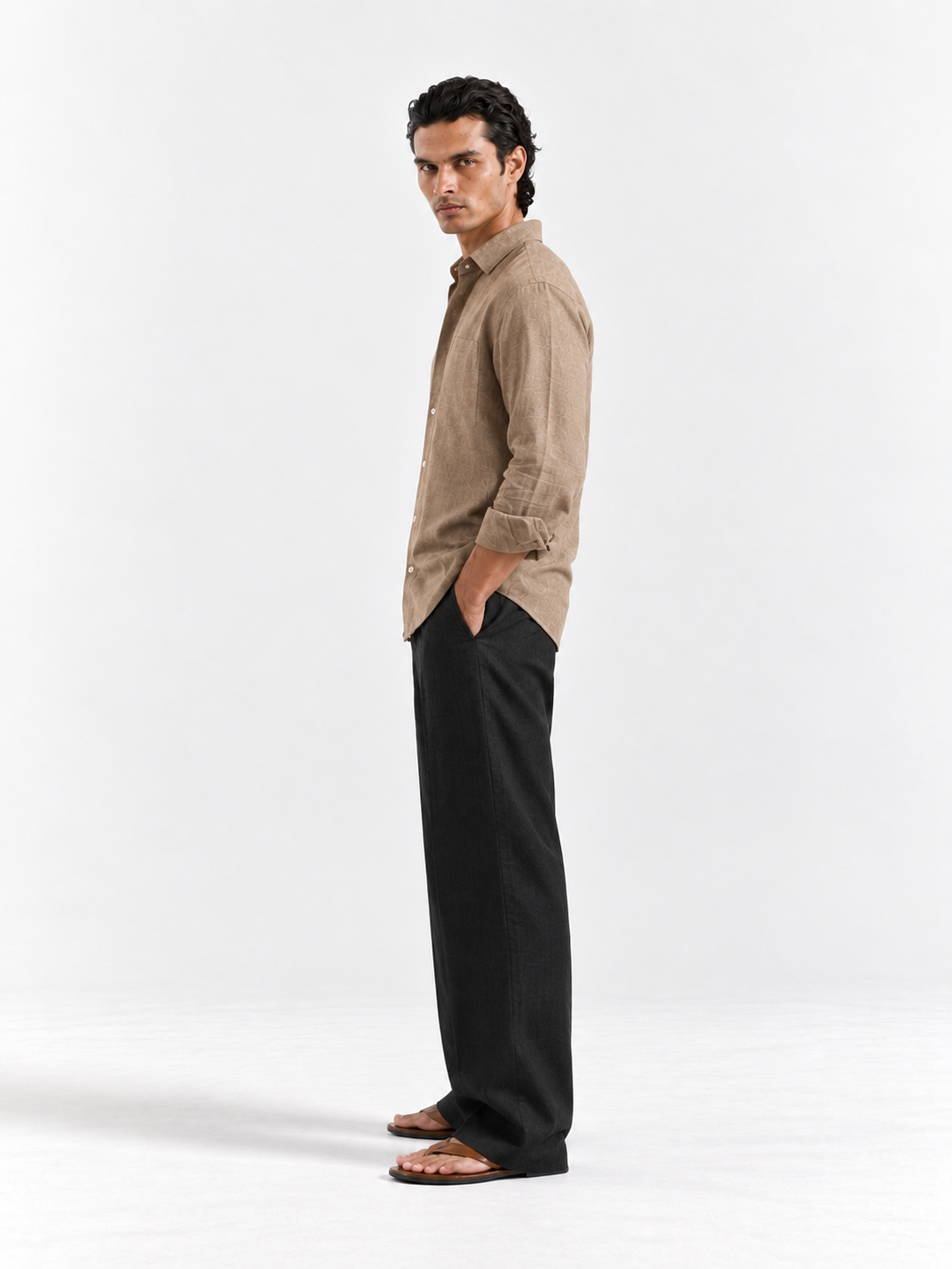 Tan linen shirt with point collar and button placket, long sleeves, side view