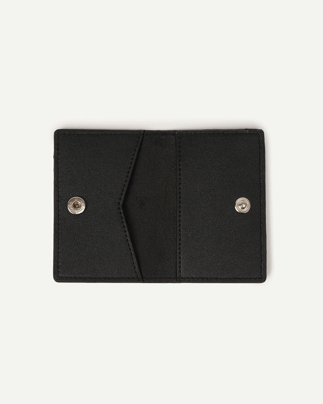 Black card holder with two snap buttons and interior fold compartments