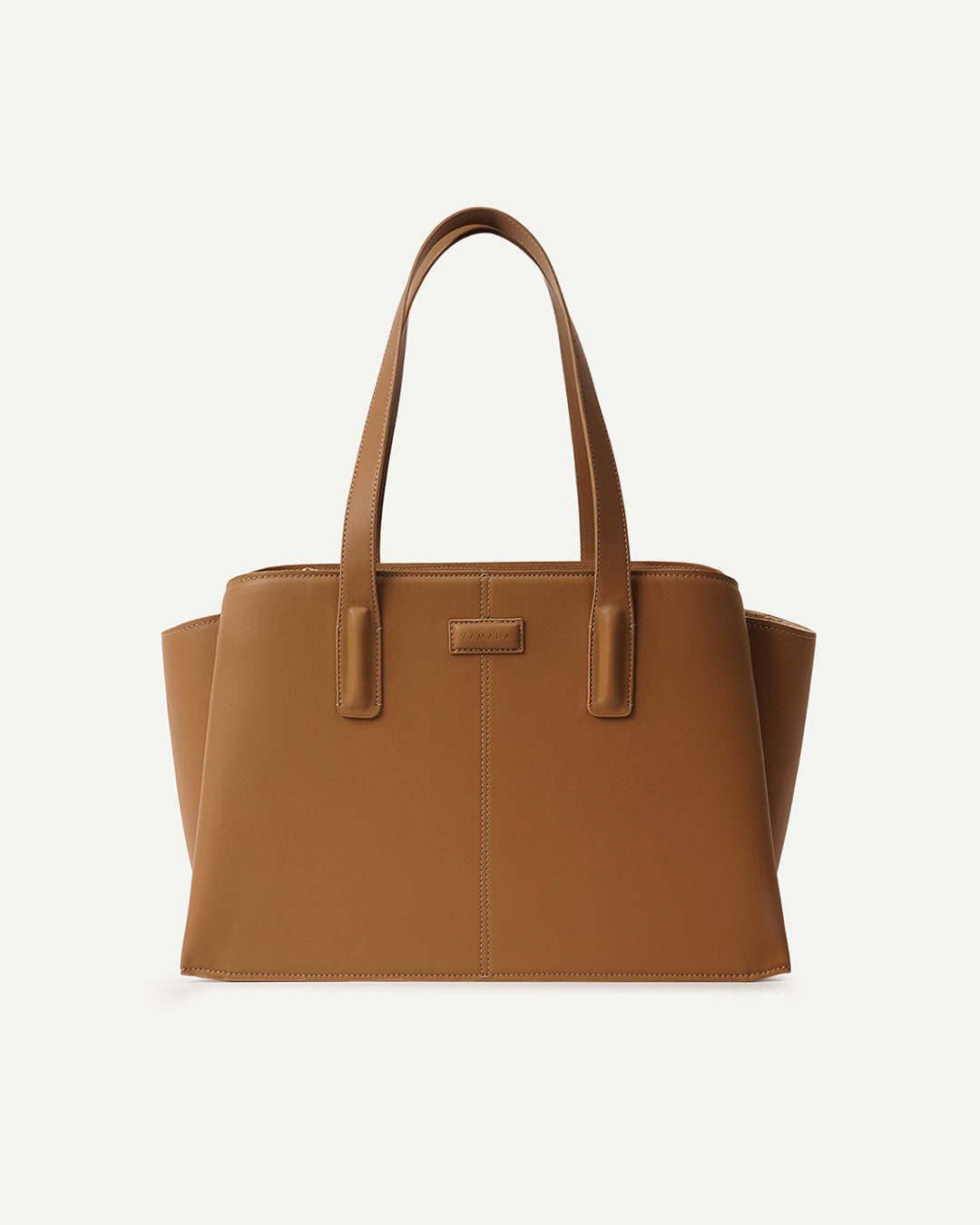 Caramel leather tote bag with two top handles and front center seam
