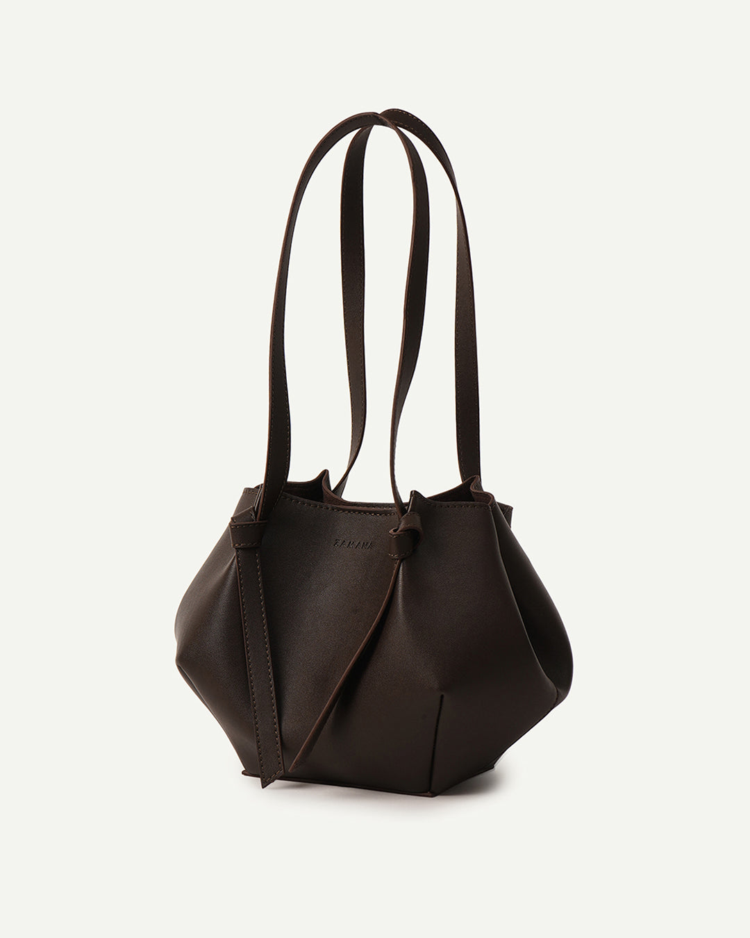 Dark brown tote handbag angled view with top handles and stitched edges