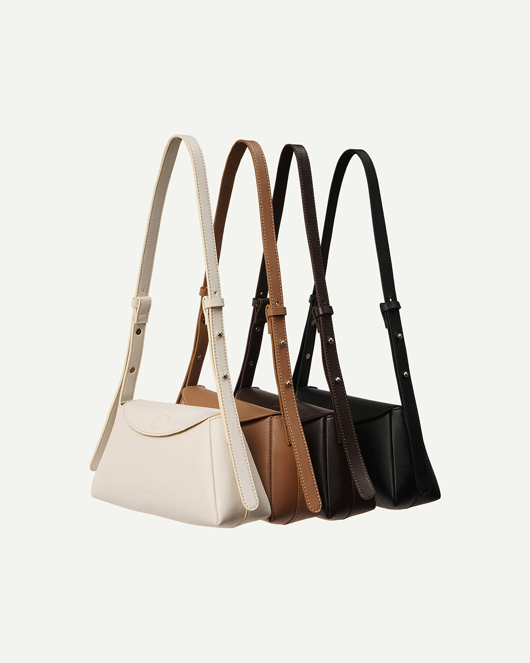 Assorted leather hobo shoulder bags in light, tan, and dark brown