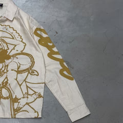Off-white long-sleeve shirt with gold line-art print and curved script detail on sleeve
