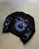 Black long-sleeve shirt with blue glowing starburst and chain graphic, crew neck.