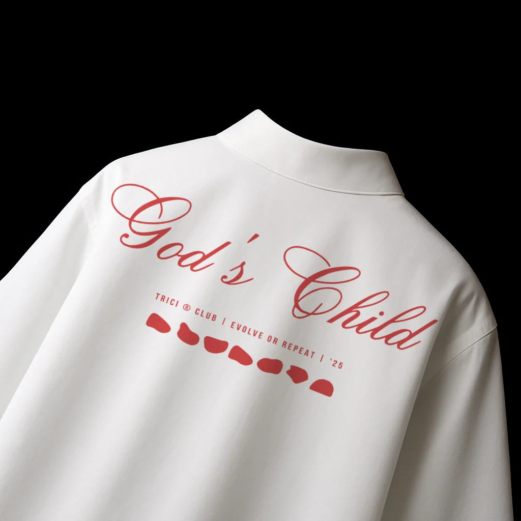 White boxy-fit shirt with red 'God is Child' script graphic on back