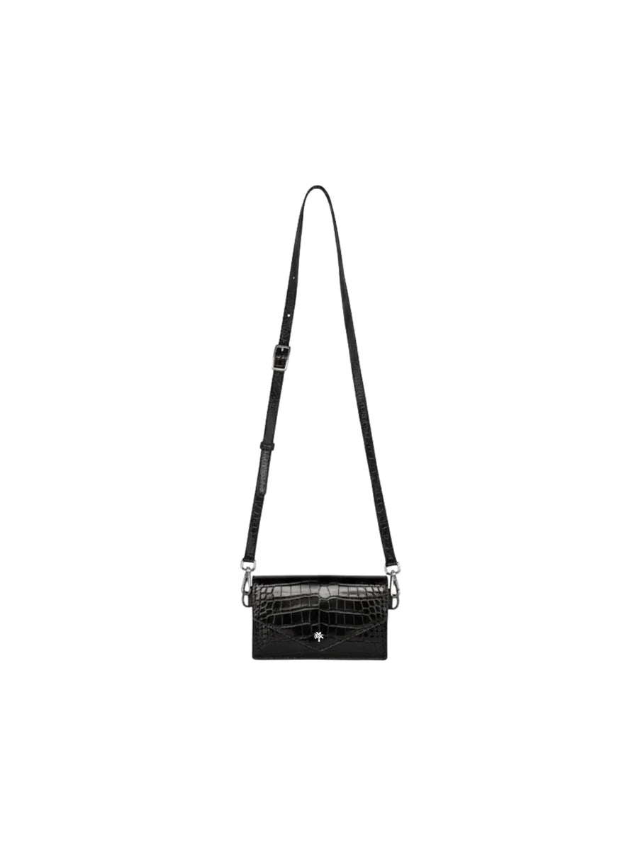Black croc-embossed leather crossbody bag with adjustable shoulder strap.
