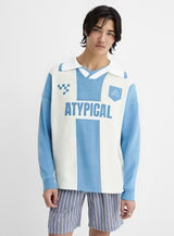Light blue and white vertical striped polo knit shirt, collar and long sleeves, worn