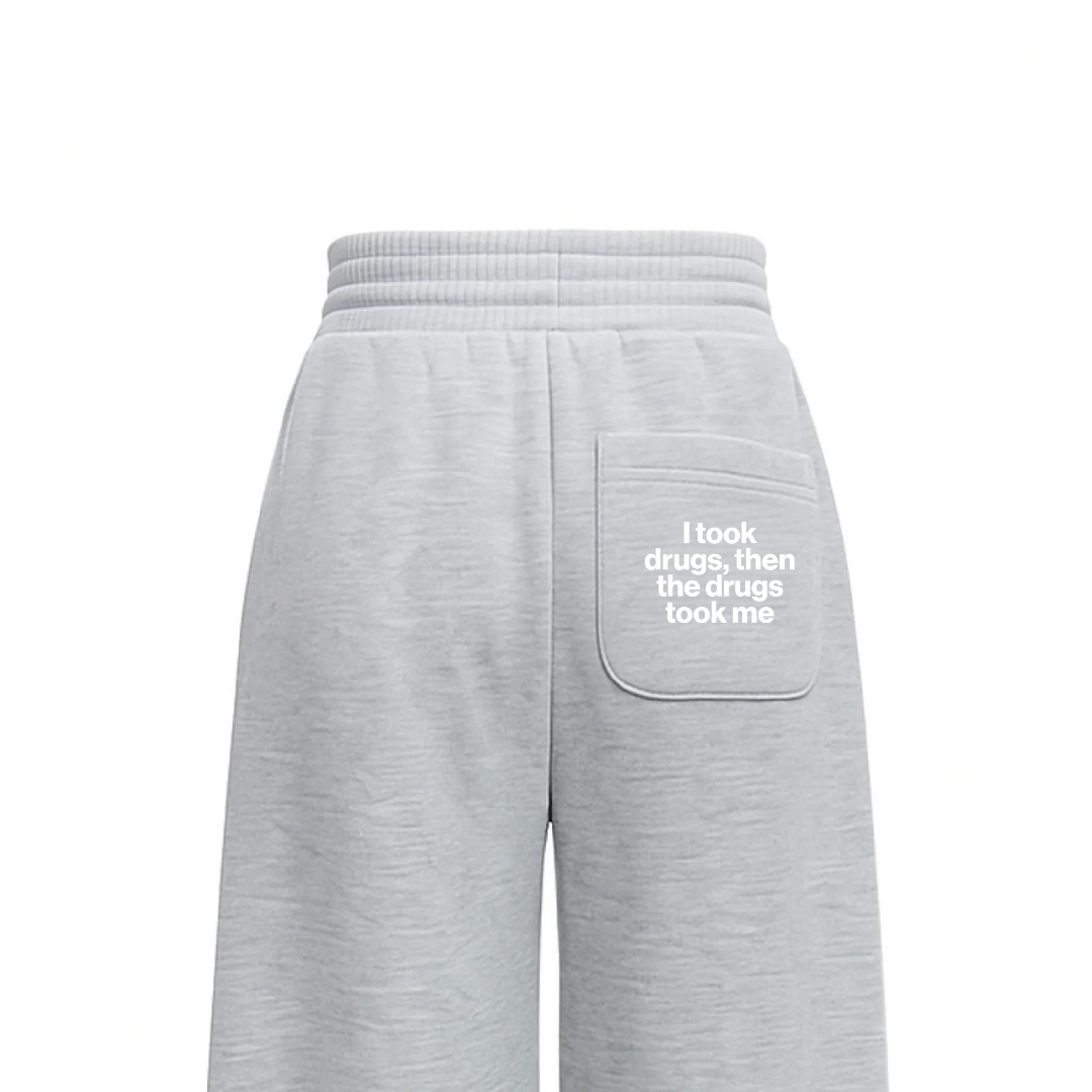 HARAH grey sweatpants with elastic waistband and front pocket with printed slogan