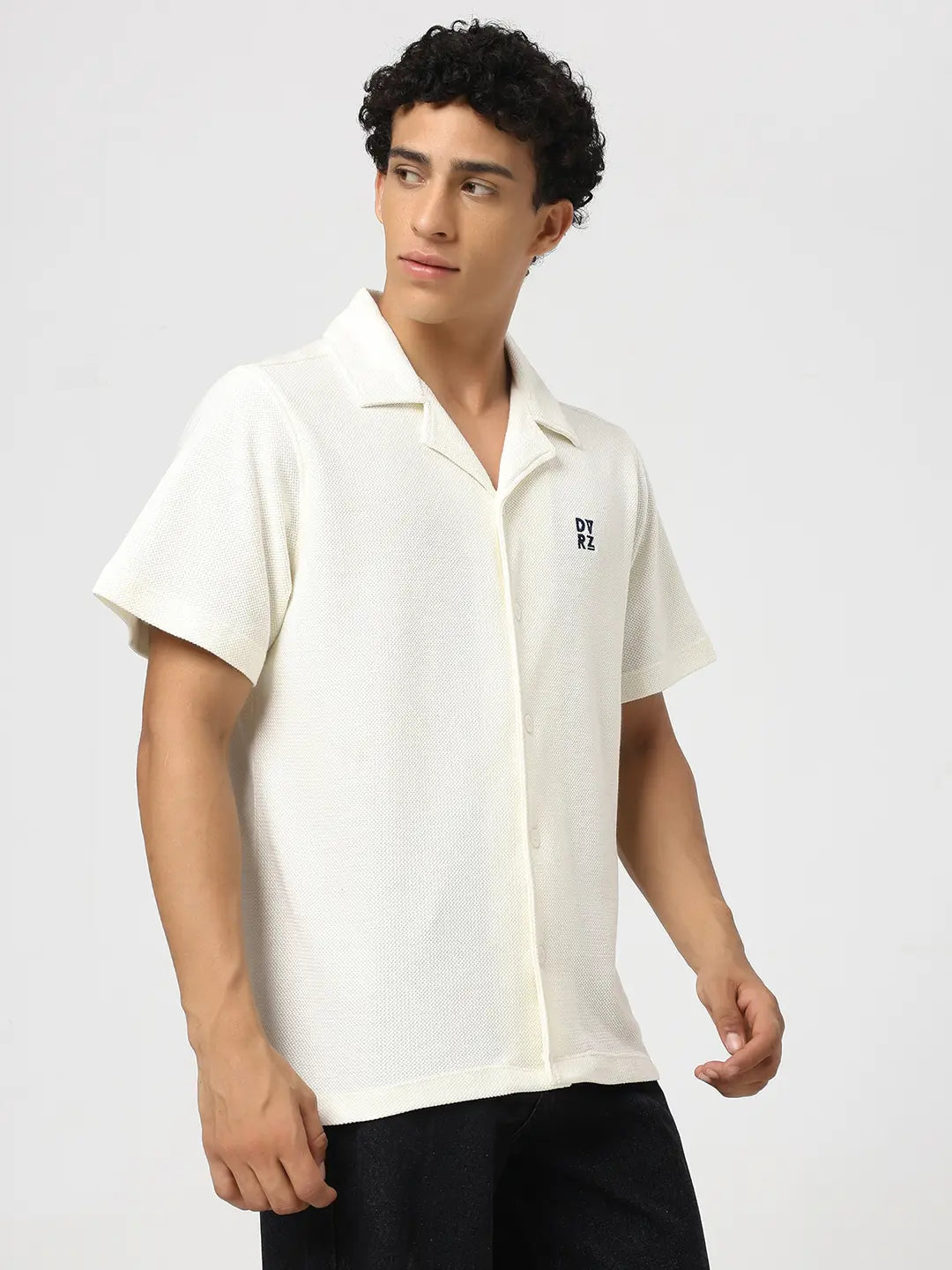Ivory textured bowling shirt front view with short sleeves and button placket