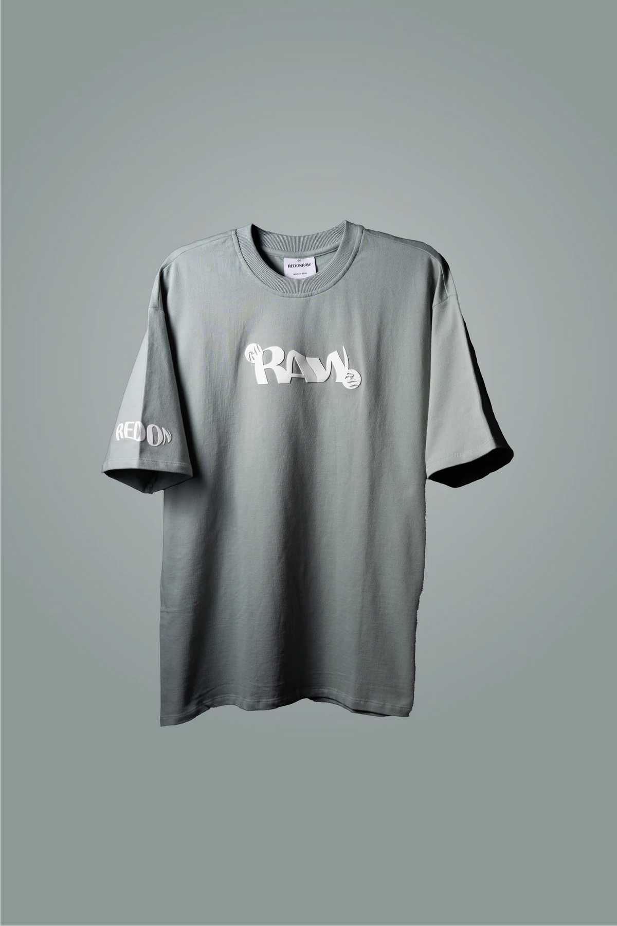 Mint green crew-neck T-shirt with small white 'RAY' logo at chest