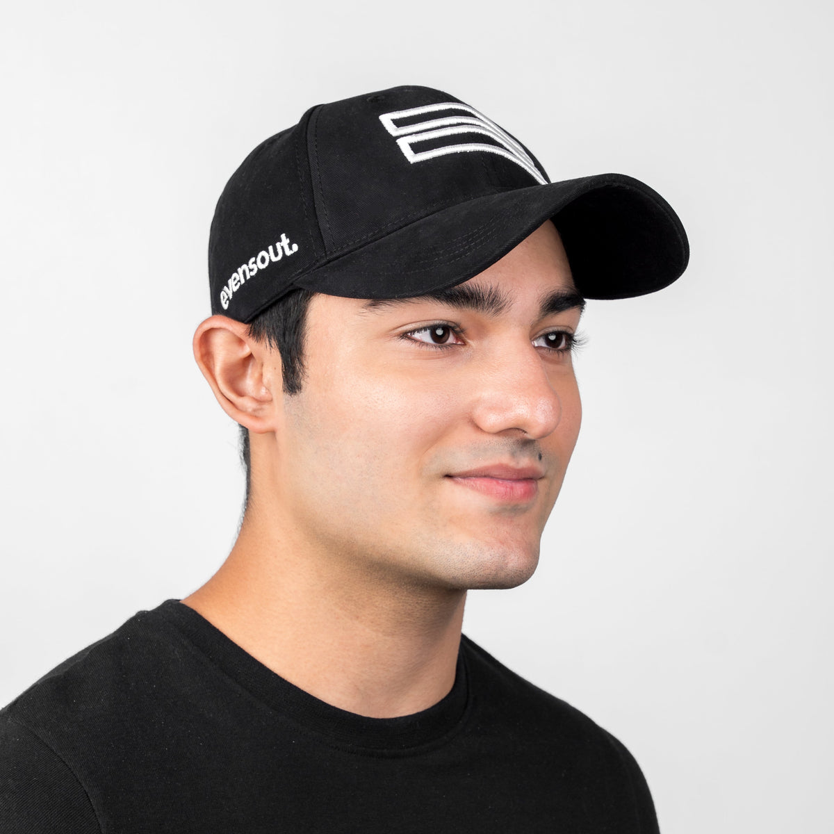 Black baseball cap with front patch logo and curved brim