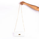 SNOW WHITE CLUTCH WALLET CUM SLING STROKES GALLERY