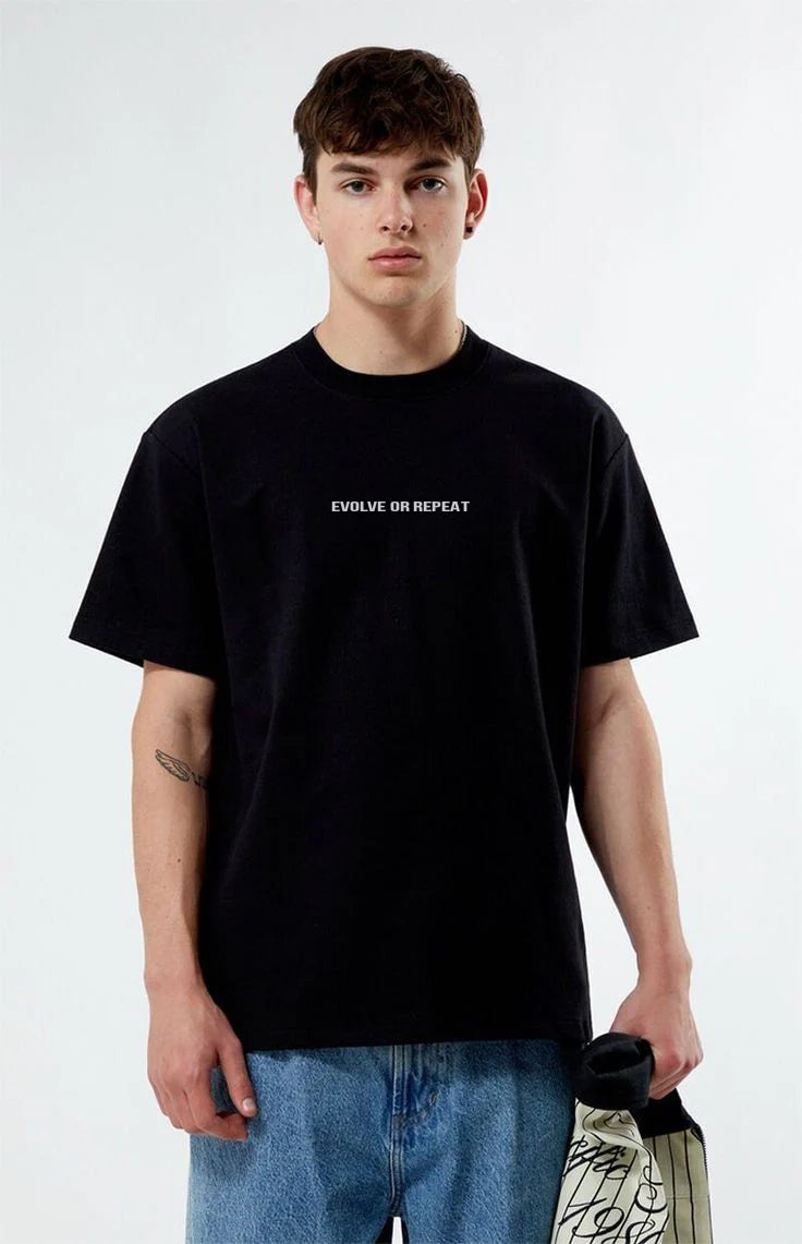 Black crewneck T-shirt with small centered text on chest