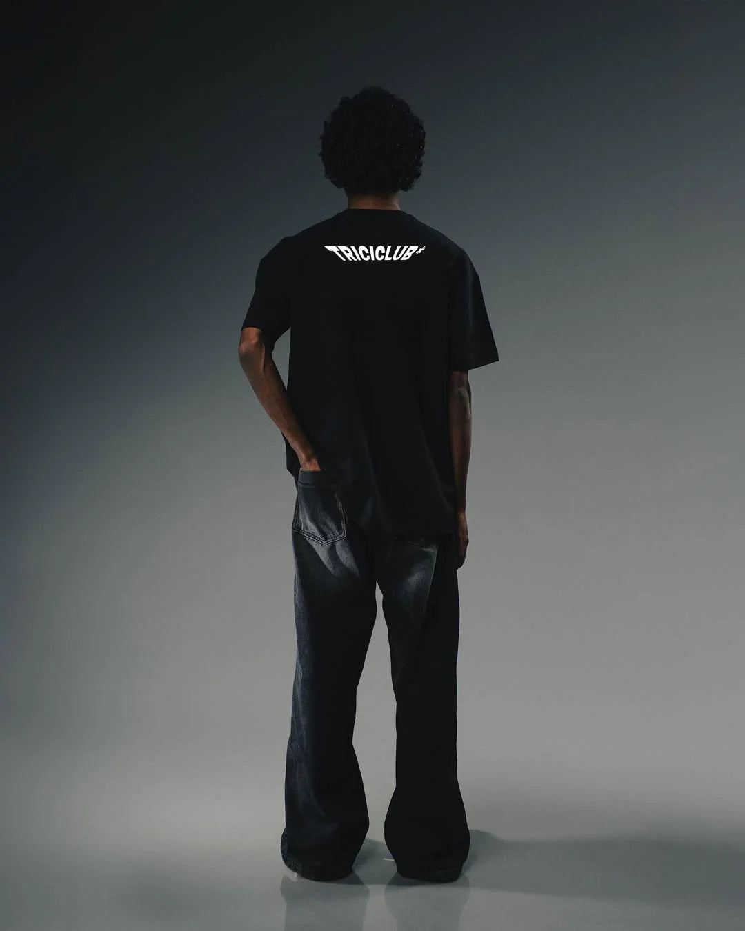 Black T-shirt with white back graphic text