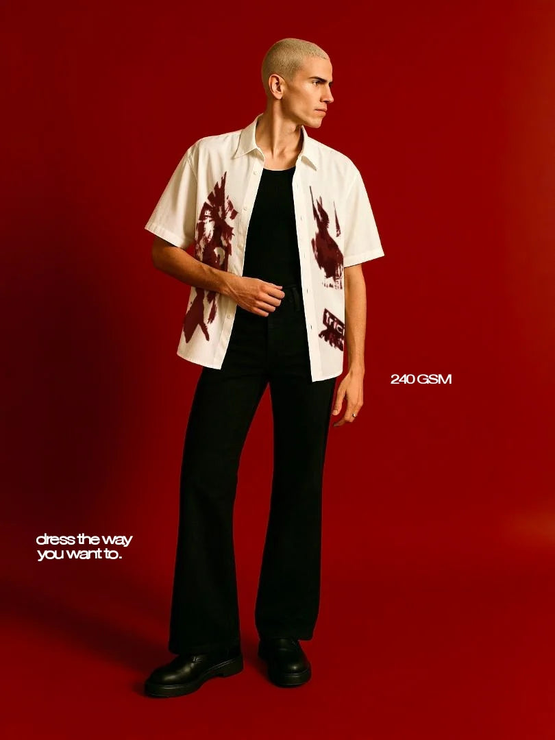 White boxy short-sleeve button-up shirt with red graphic print and relaxed fit