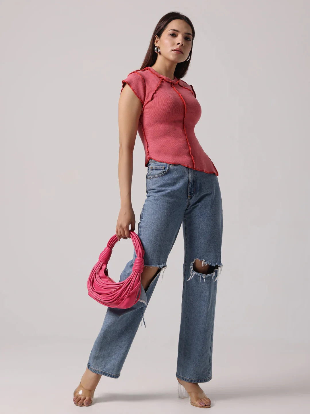 Rose-pink sleeveless-looking short-sleeve top with exposed seams and round neck