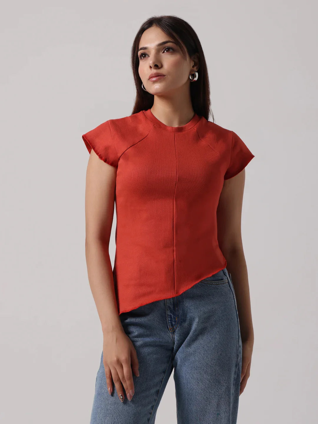 Red cap-sleeve top with stand collar and visible front seam stitching